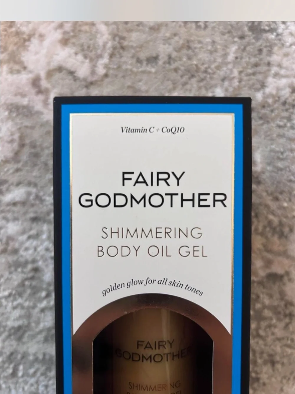 Sunday Riley Fairy Godmother Shimmering Body Oil Gel - Blue and Gold Accents
